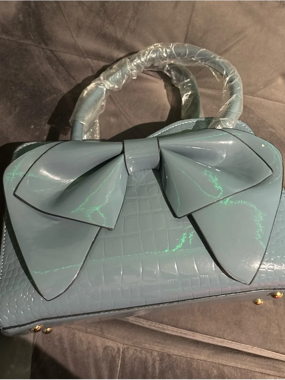 Patent Bow-Accent Top-Handle Clutch in Teal